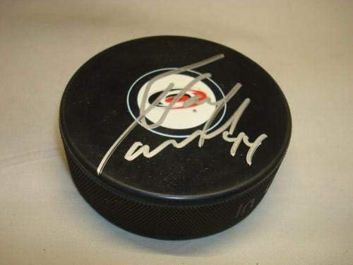 Джей Харисън подписа Хокей шайба Каролина хърикейнс с автограф 1Б - за Миене на НХЛ с автограф