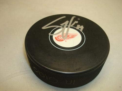 Стив Отт подписа хокей шайба Детройт Ред Уингс с автограф 1А - за Миене на НХЛ с автограф